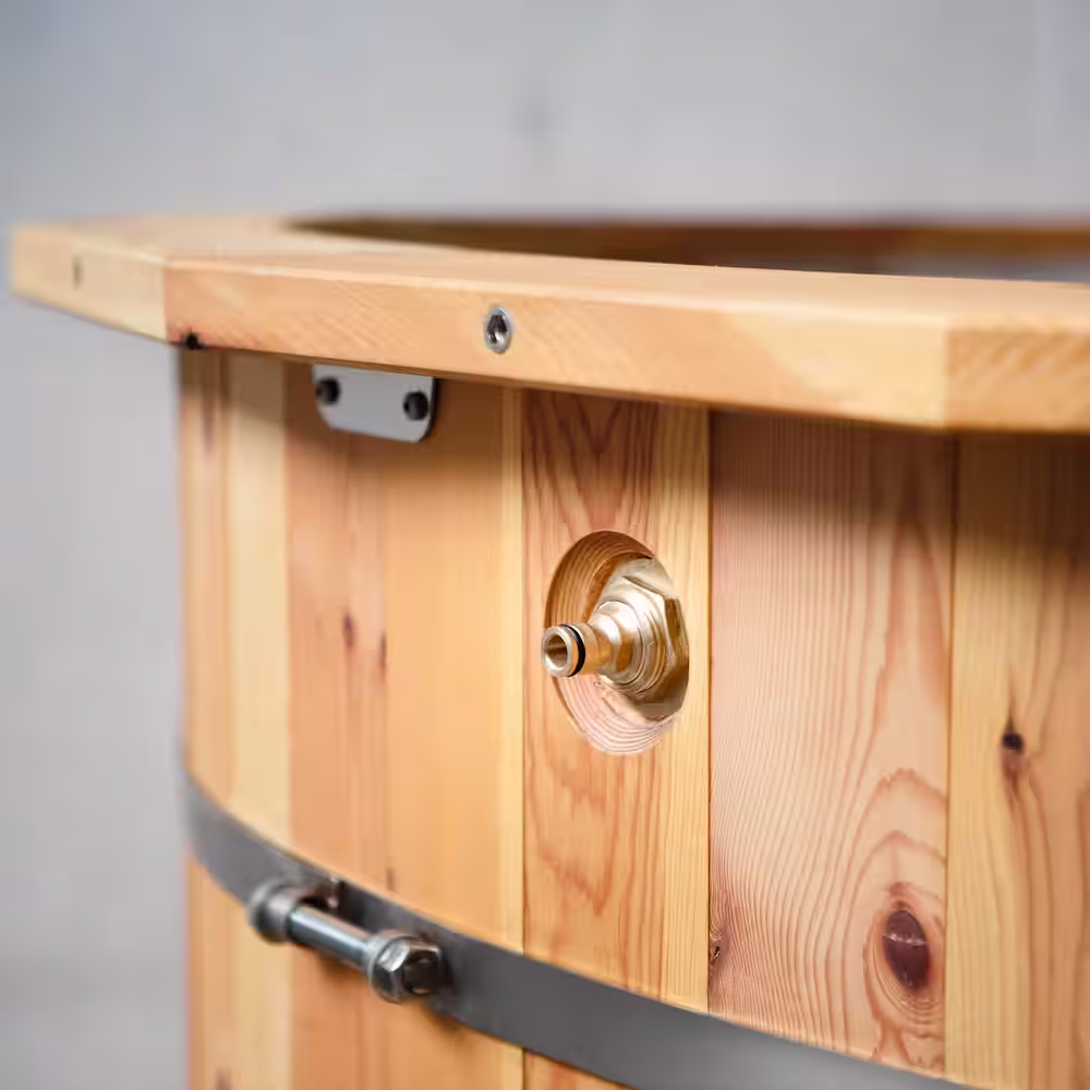 Water inlet with click valve on the wood-fired hot tub